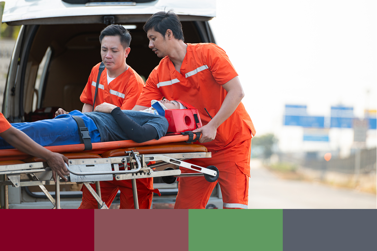 A patient strapped to a gurney is placed with care by paramedics into the back of an ambulance. Dr. Pattison is committed to caring for you after an untimely accident.